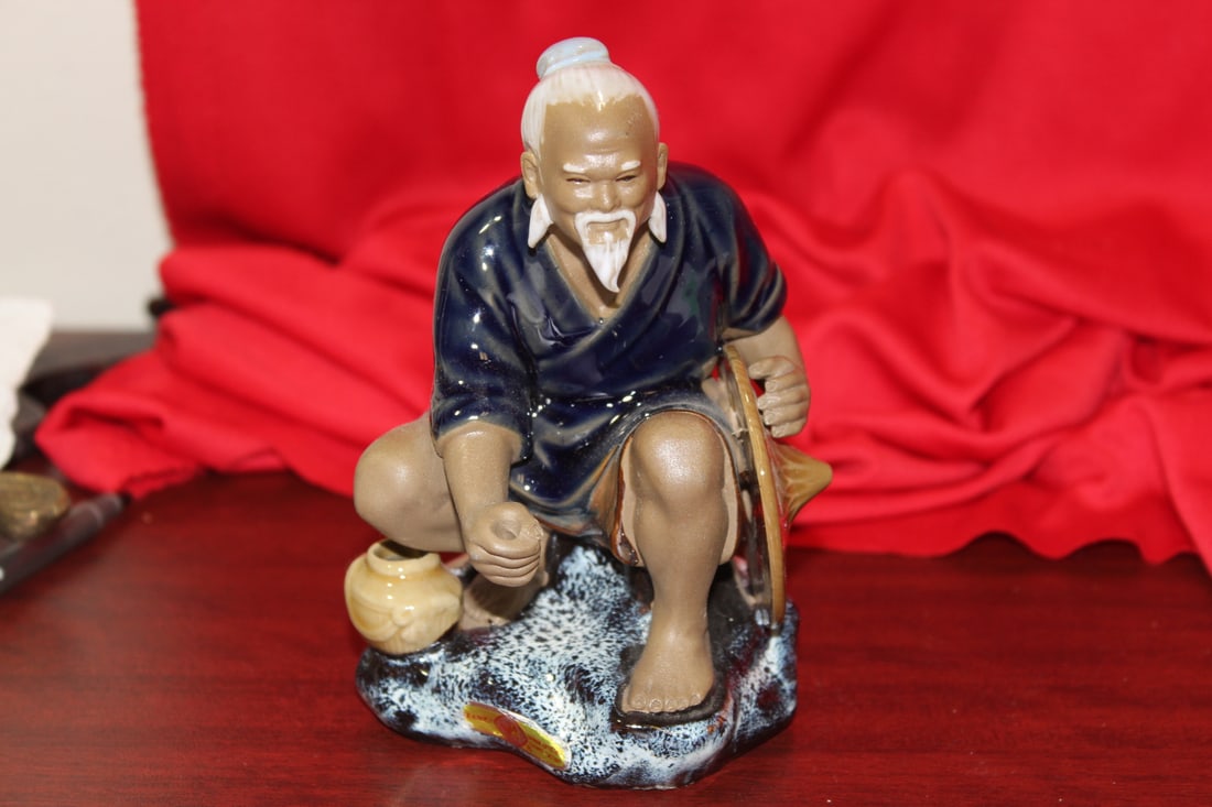 A Chinese Pottery Figurine: most likely missing a wooden fishing pole - 5 1/2" tall