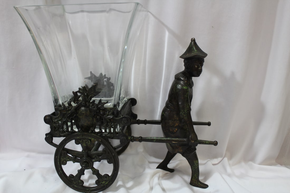 A Cast Iron Rickshaw Glass Planter: please note: chip on the glass planter - overall height= 12 3/8" tall - impressive piece