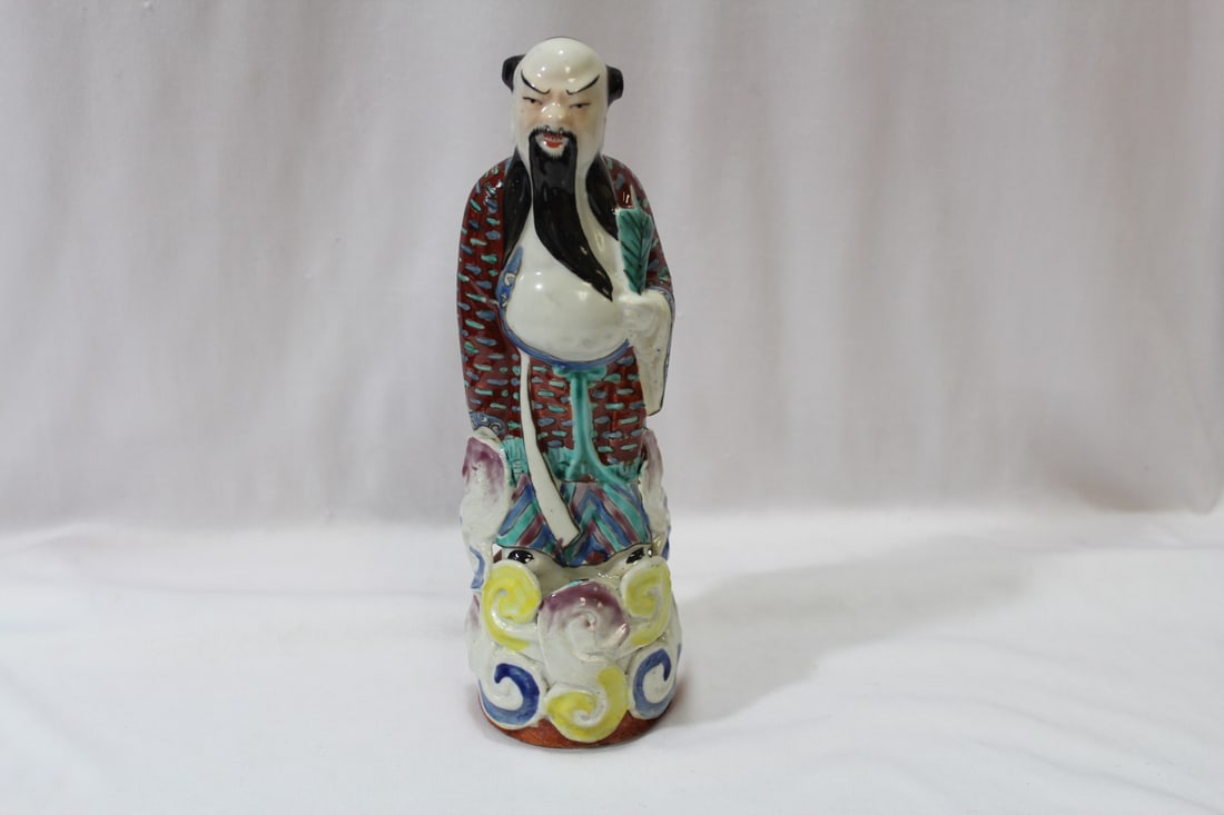 A Chinese Man: marked China - makers mark - 9 7/8" tall