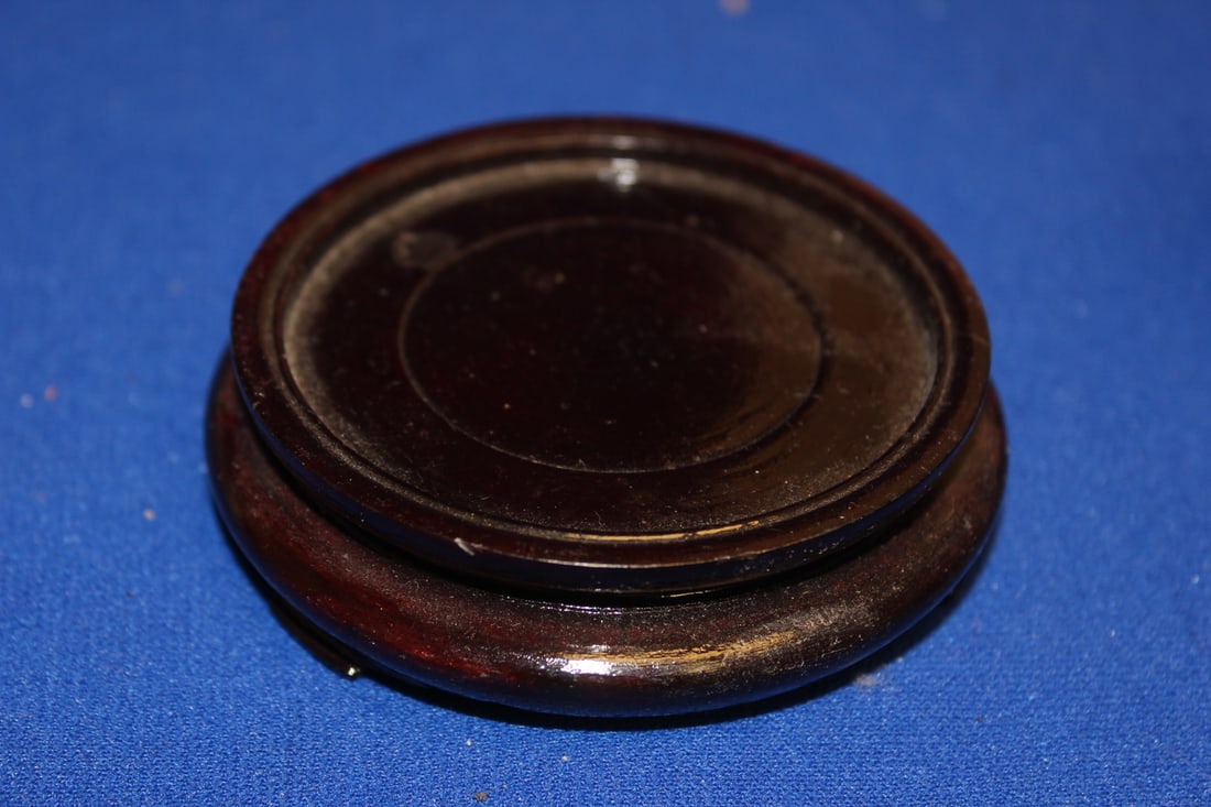 A Wooden Vase Stand: inside diameter= 2 3/8"