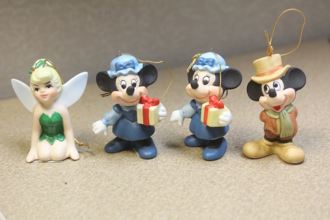 Lot of 4 Disney ornaments: ceramic, each approximately 3" tall