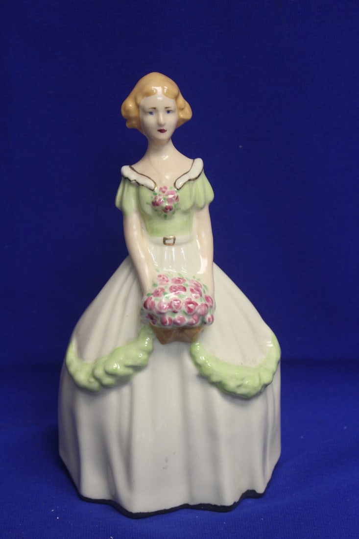 Porcelain Figurine of a Girl: 8 3/4" tall