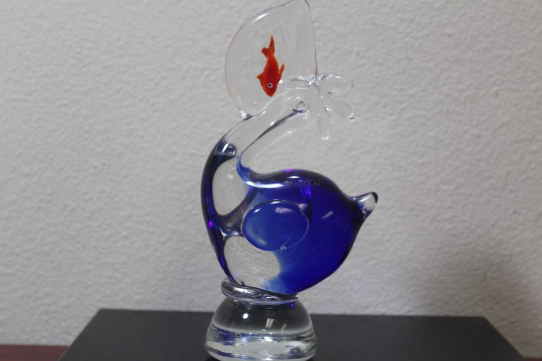 An Artglass Dolphin with Fish: 8 1/4" tall