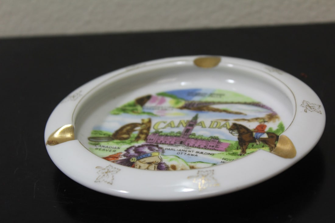 A Canada Ceramic Ashtray: 5" across