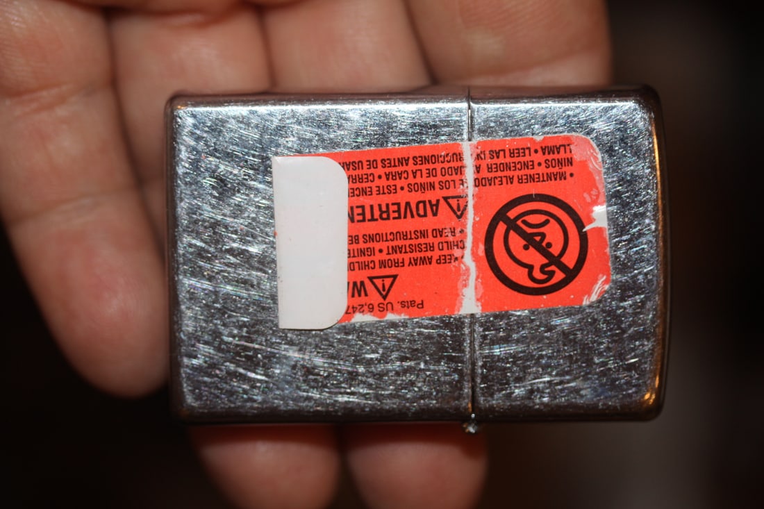 Zippo Lighter: as shown on photos