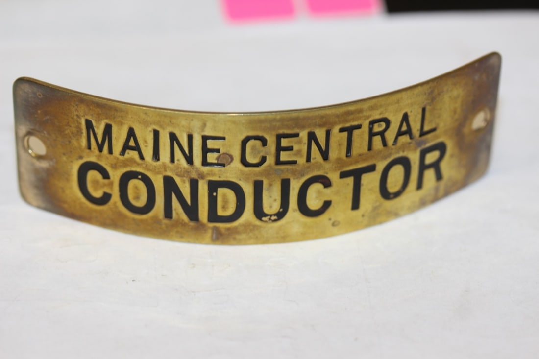 A Vintage Maine Central Conductor Head Badge: as seen on photos
