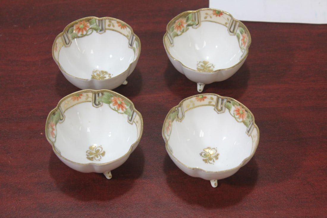 Set of 4 Nippon Nut dishes: please note: one has a tiny chip as shown - 3 inches in diameter - all footed