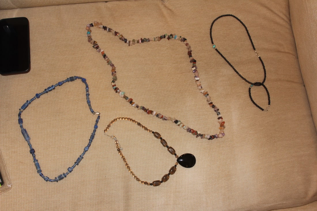 Lot of 4 Gemstone Necklaces: to include turquise, lapis, onyx etc