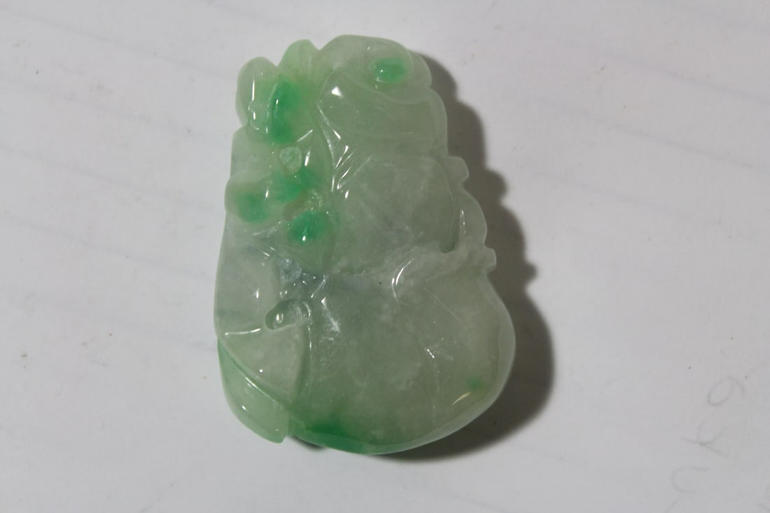 A Jadeite Pendant*** - 2