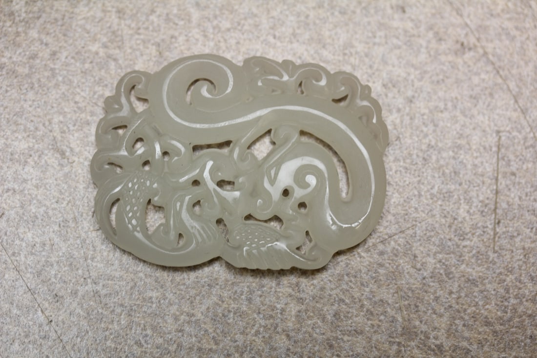 Jade Pendant: carved on both sides - 2 1/8" in diameter