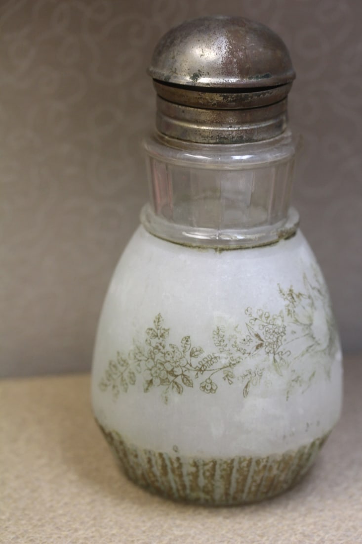 Old glass bottle: 7" tall
