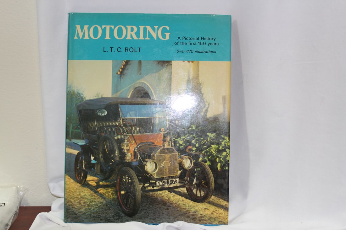 A Hardcover Book: Motoring (1 of 5)