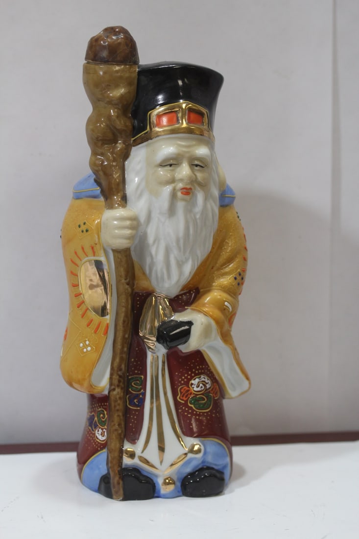 A Japanese Kutani Figurine: 10 7/8" tall