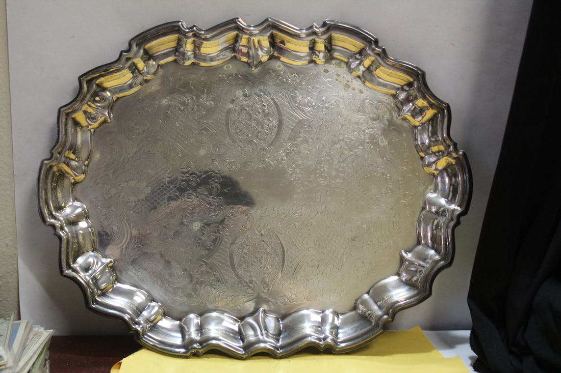 An Ornate Silverplated Tray: 14 1/2" across