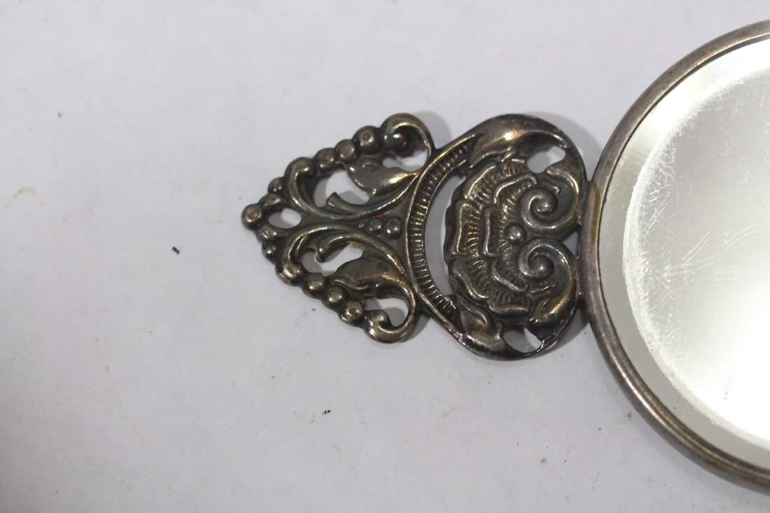 A Dutch Silverplated Repousse Mirror - 5
