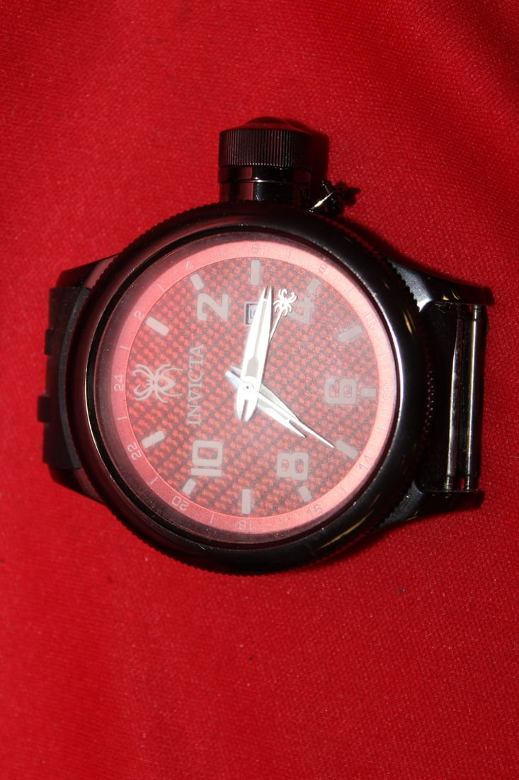 An Invicta Watch: needs new band - currently working, but cannot guarantee to work when it arrives