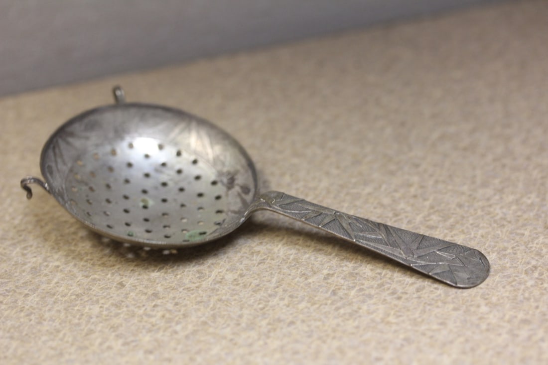 Sterling Japanese strainer: possibly Chinese, signed, 4 3/4" across, rare