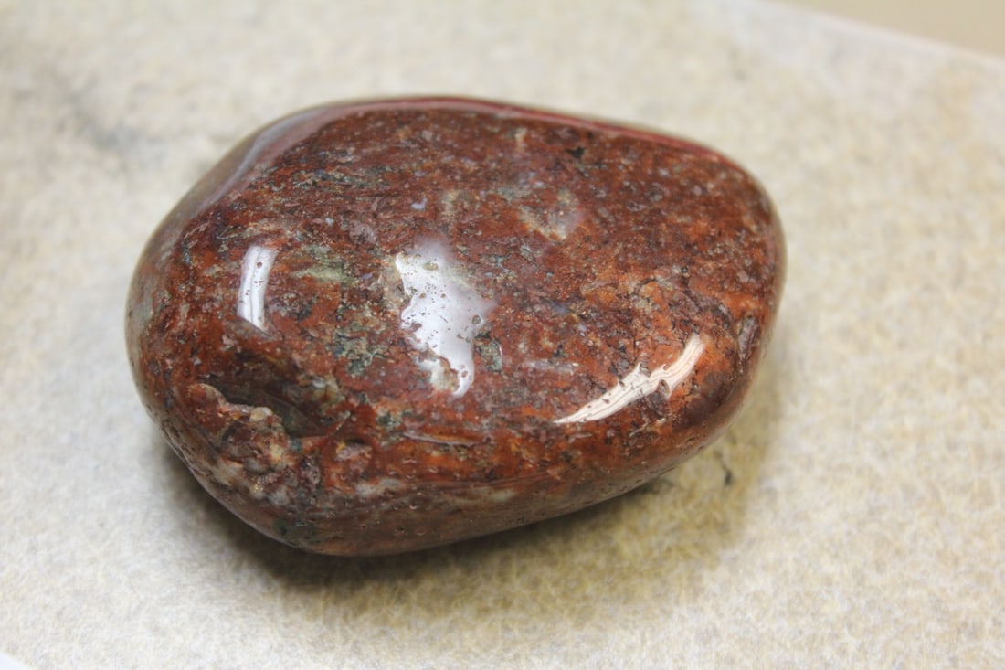 A Piece of Gemstone: 2 1/2" in diameter = gemstone name= unknown