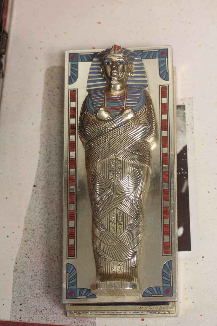 The Treasures of Tutankhamun Card Box: with playing cards - cards still sealed - composite material - limited edition - please note: chips as shown, so selling it as found - 8 3/8" across
