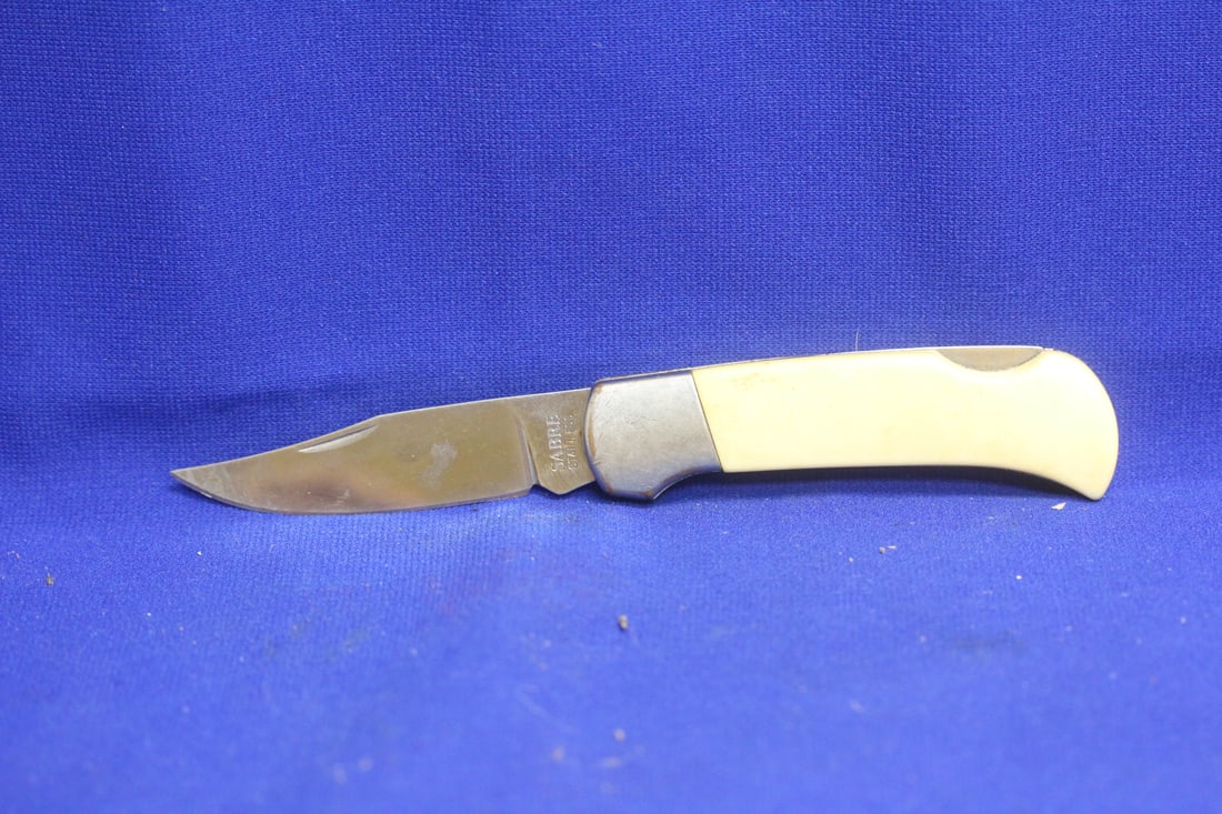 Sabre Pocket Knife: 4" long when folded