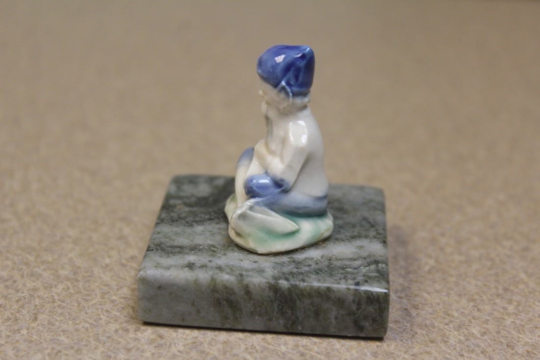 small ceramic oriental man on stand - 2