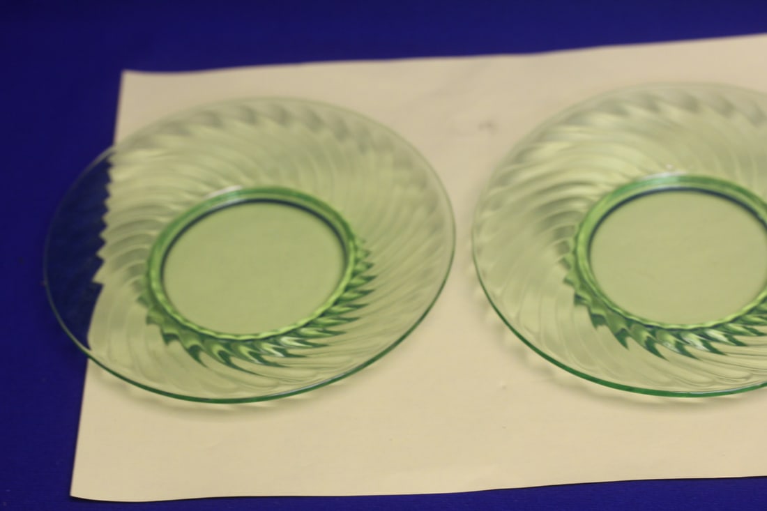 Lot of 2 Vaseline Glass Plates: 6" in diameter - swirl design