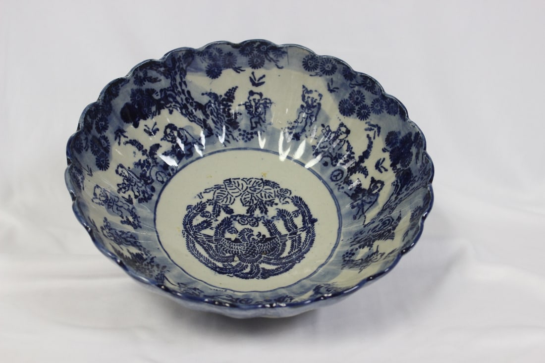A Chinese/Japanese Blue and White Bowl: 9 1/2" in diameter - most likely 19th century