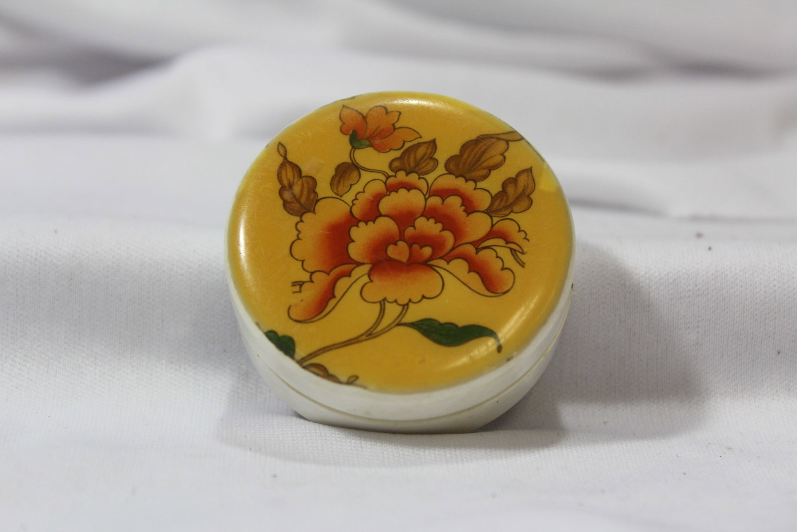 An Old Plastic Trinket Box or Powder Box (1 of 3)