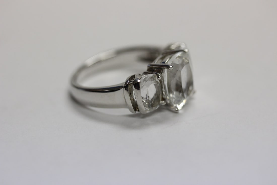 A Sterling Ring with Clear Stones: marked