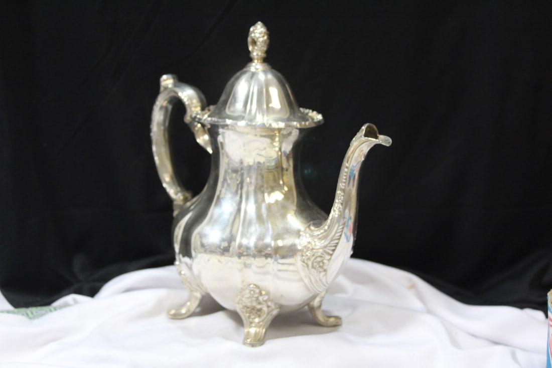 A Silverplated Teapot - 10