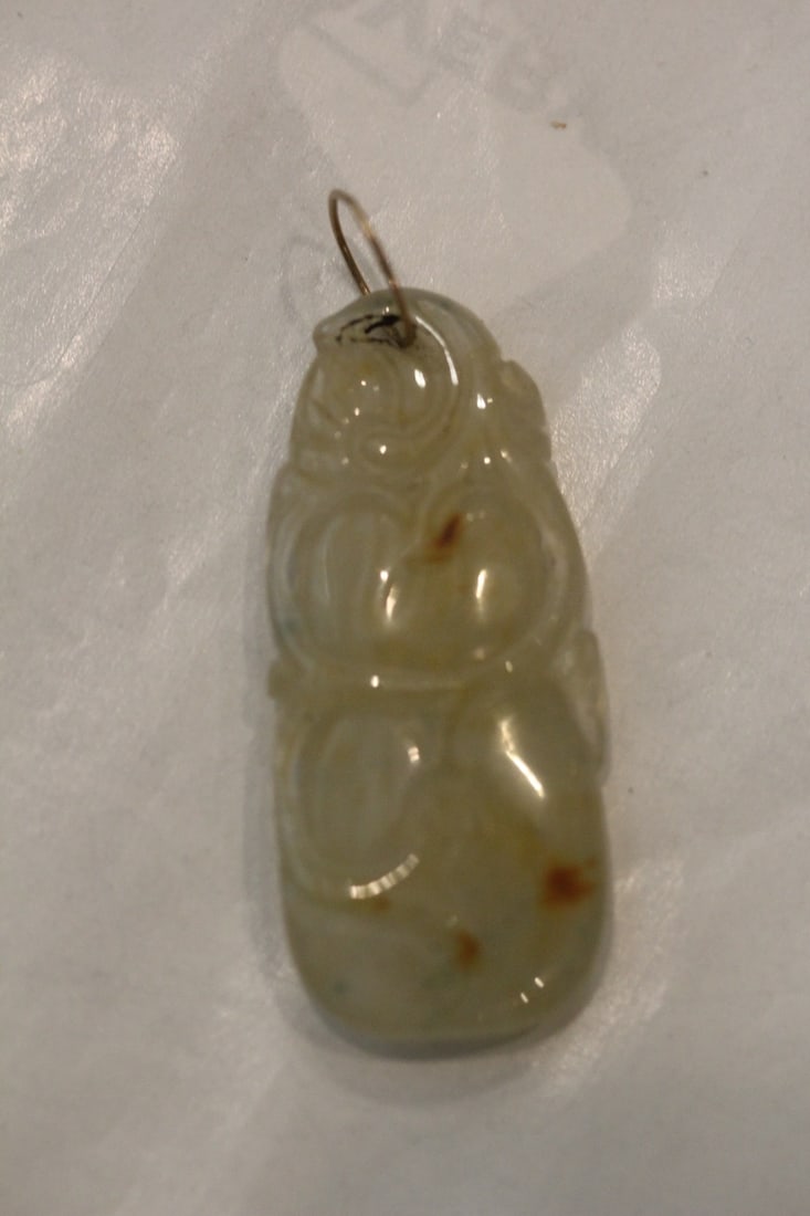 Jadeite or Agate Pendant: both sides are carved - 1 5/8" long - bail= 14 karat gold