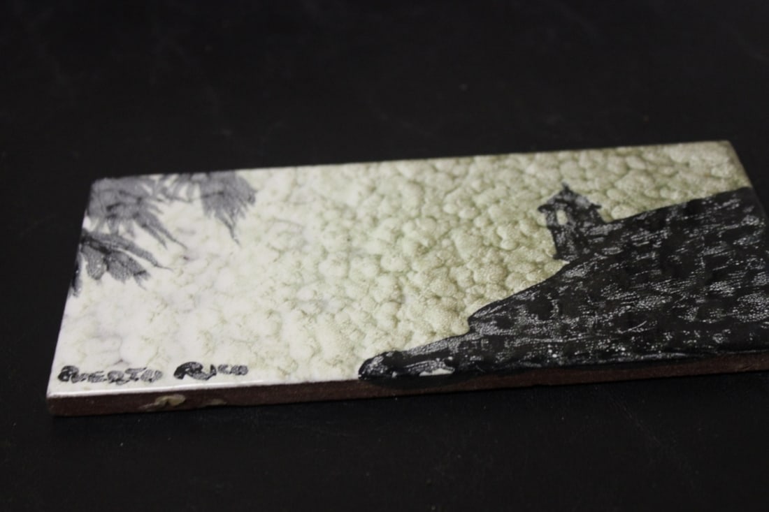 A Hand Painted Tile: 7 3/4" long