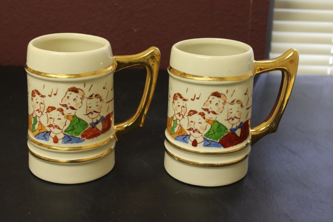 Lot or Set of Two Mugs: Each measures 5 7/8 inches in height