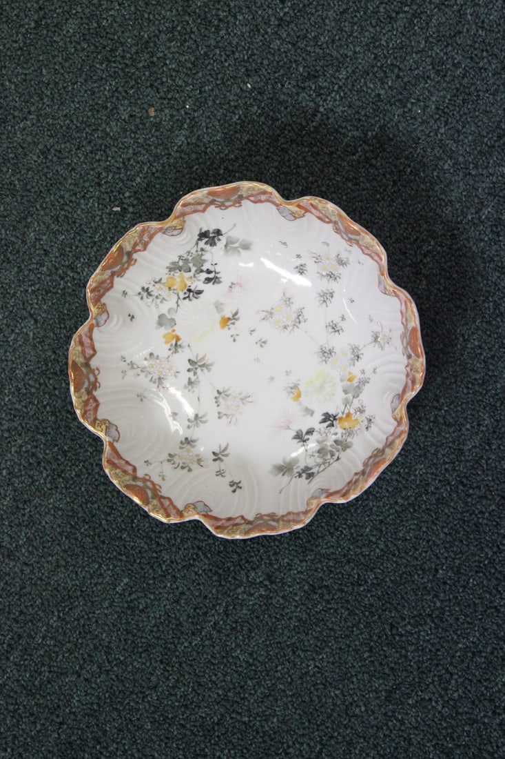 A Japanese Kutani Bowl: Signed on the bottom - foliated rim - very desirable - 8 3/4" in diameter