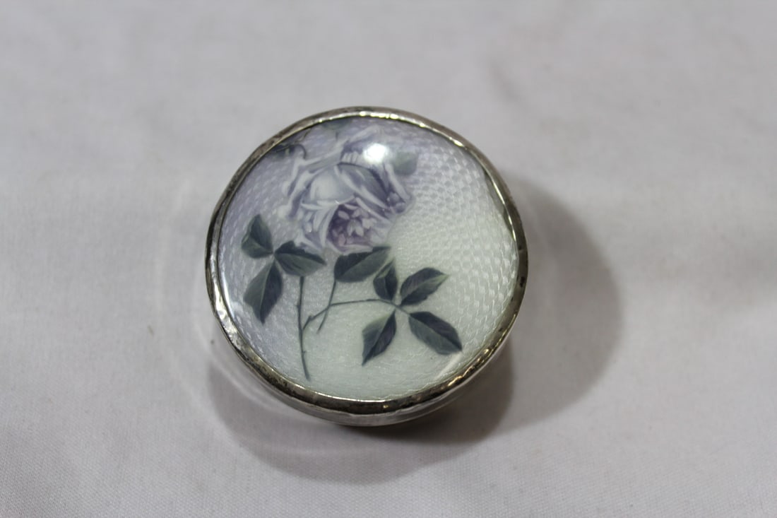 A Guilloche Compact: marked 900 silver - please note: rim bump - 2 3/8" in diameter