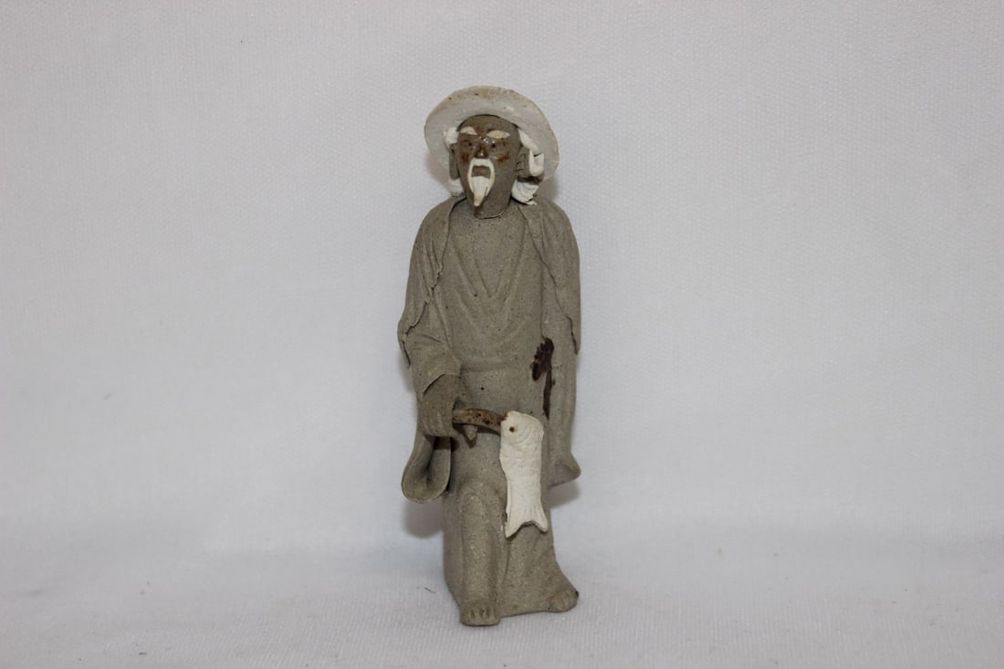 A Chinese Mud Figurine: 3 1/2" tall
