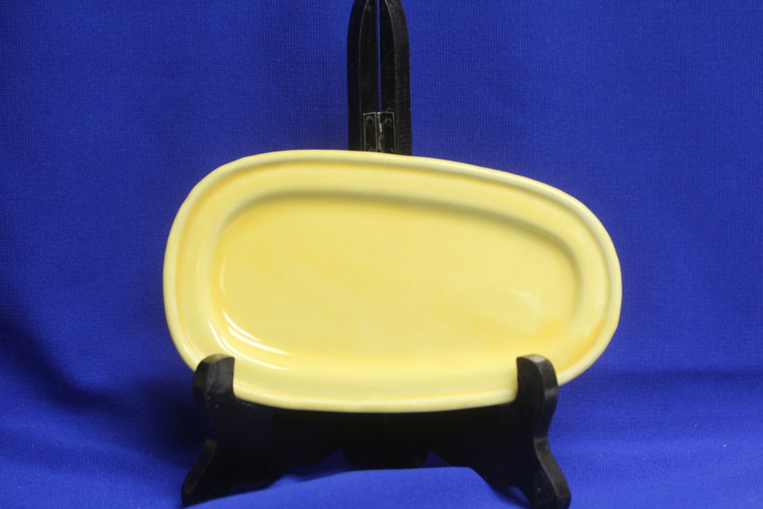 A Shawnee Pottery Butter Dish: 7 1/8" across