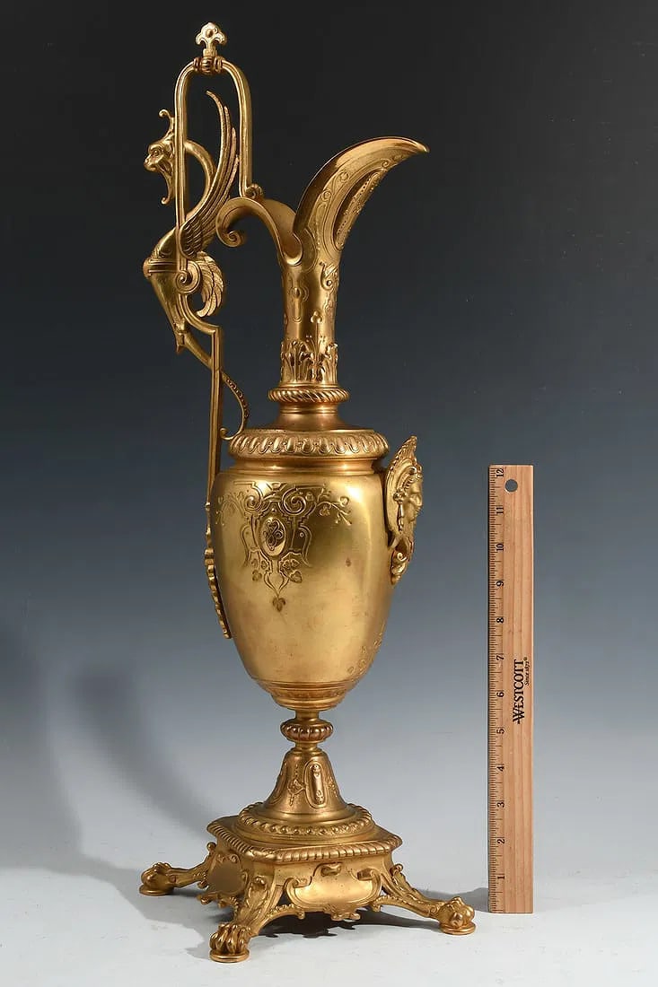 Antique Gilt Bronze Ewer: 19th century - French - with griffin handle and lion's paw feet - 24" in height x 9 1/2" wide x 9 7/8" deep
