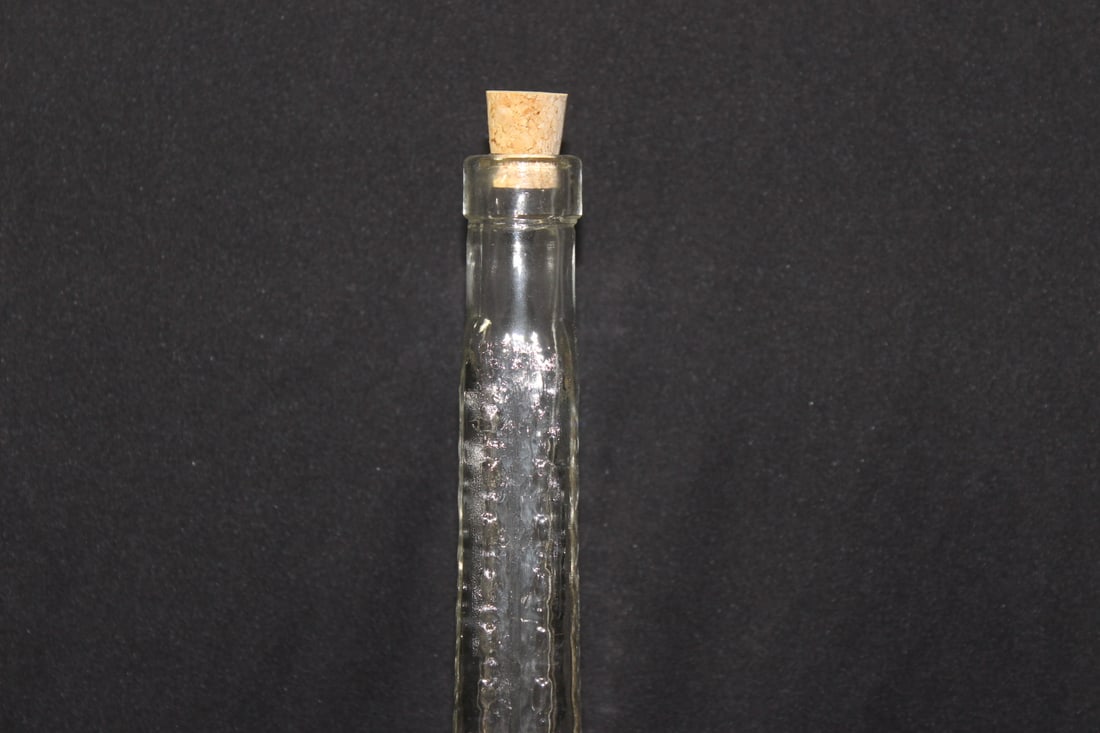 A Glass Eiffel Tower Bottle: 14" tall