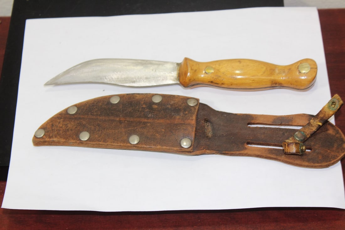 A Bowie Knife: with leather holder - overall= 10 1/2" long