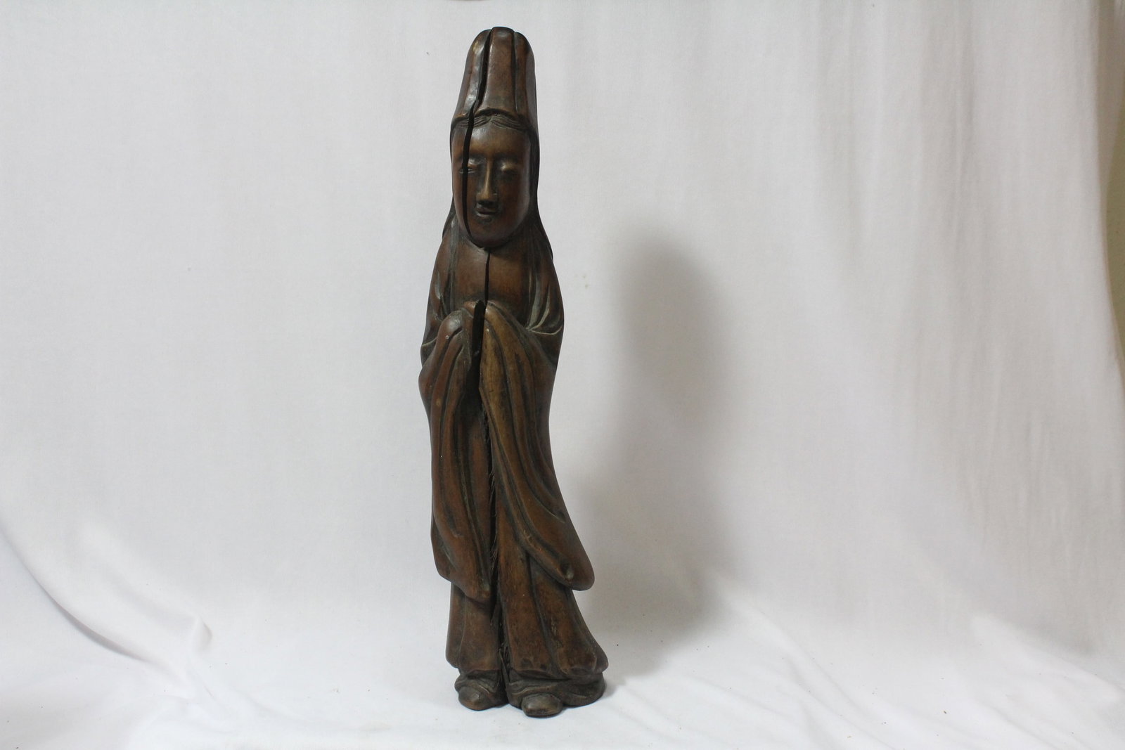 A Chinese Wooden Kwan Yin: please note: crack, due to old age - 13" tall