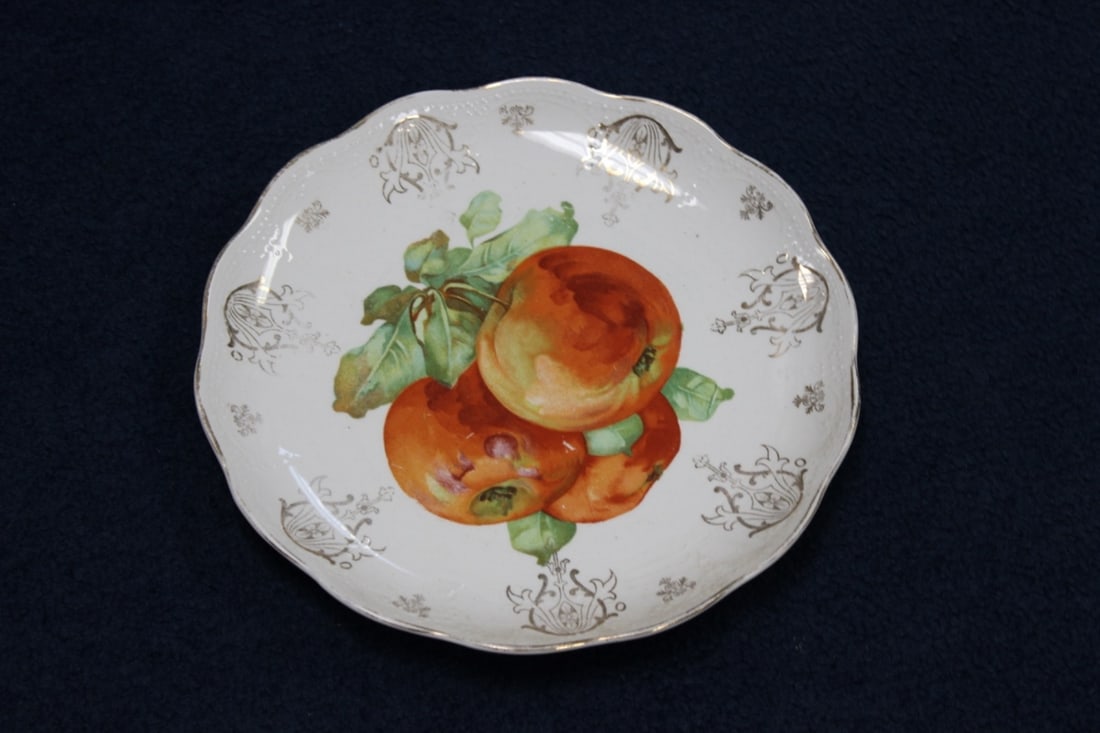 A Dresden China Plate: 9 3/8 inches in diameter