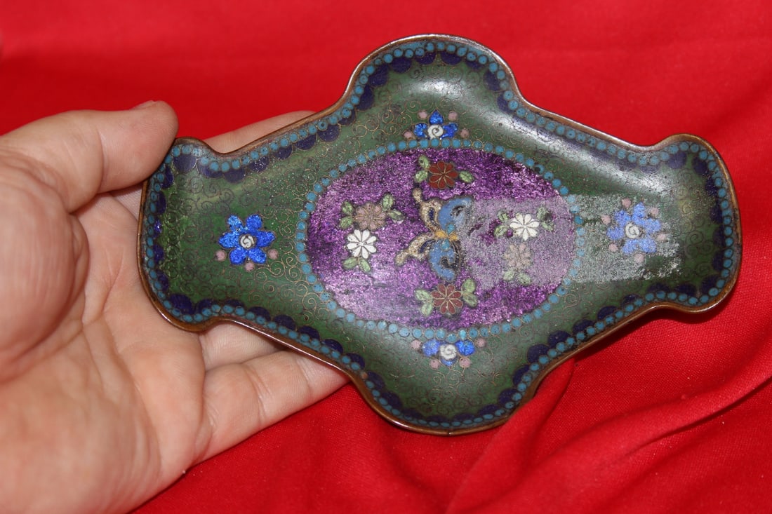 A Japanese Cloisonne Plate: 19th century - unusual design - 6" across - please note: bruises on the back