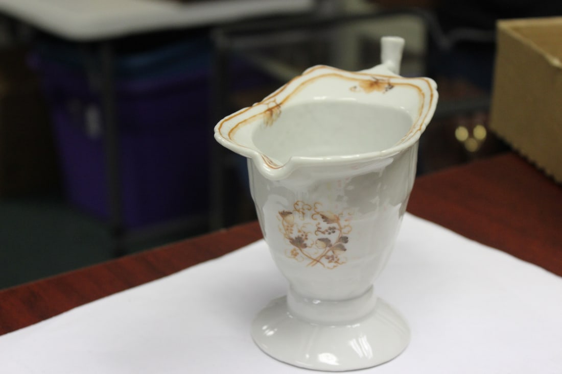 An Antique Chinese Libation Cup: Porcelain construction - 18th/19th century - 6 1/2" wide x 5 1/4" tall