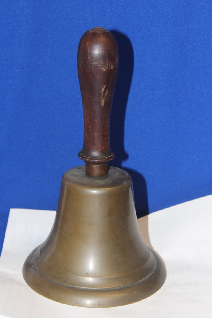 A Brass Bell: with wooden handle - 9 1/2" tall - most likely a teacher's bel - possibly 19th century