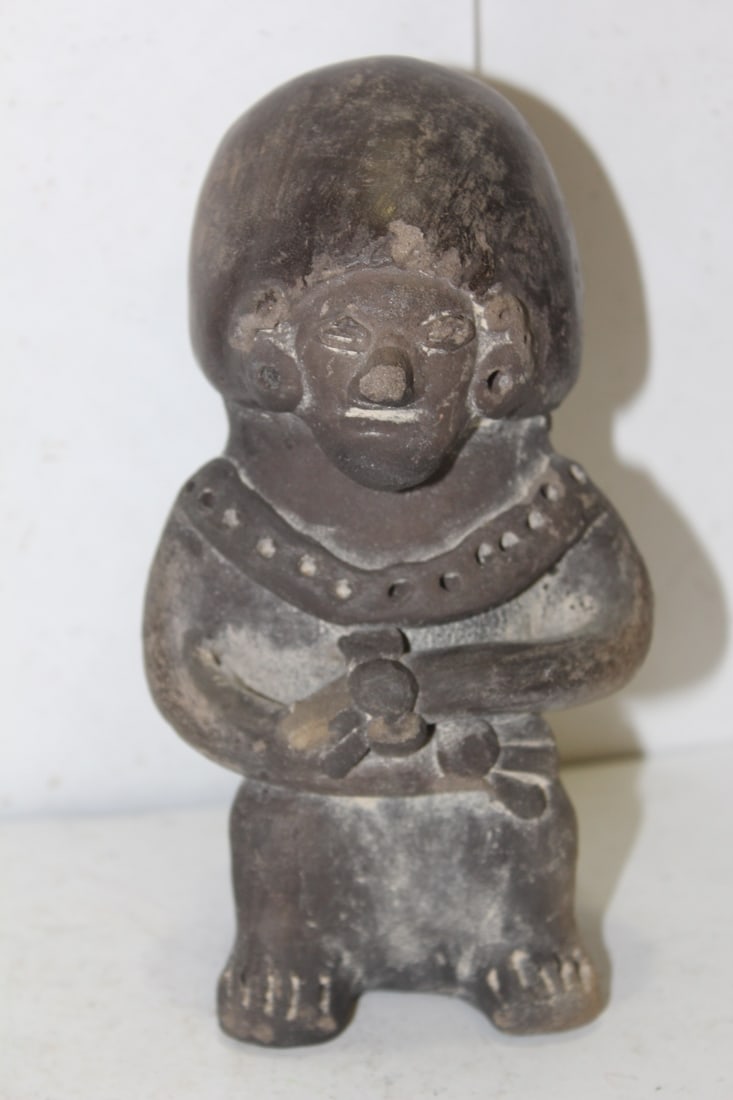A Terracotta Figurine: 6 5/8" tall - possibly old, but exact age is unknown