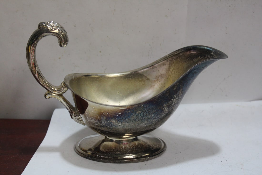 A Silverplated Gravy Bowl: 7 1/2" across