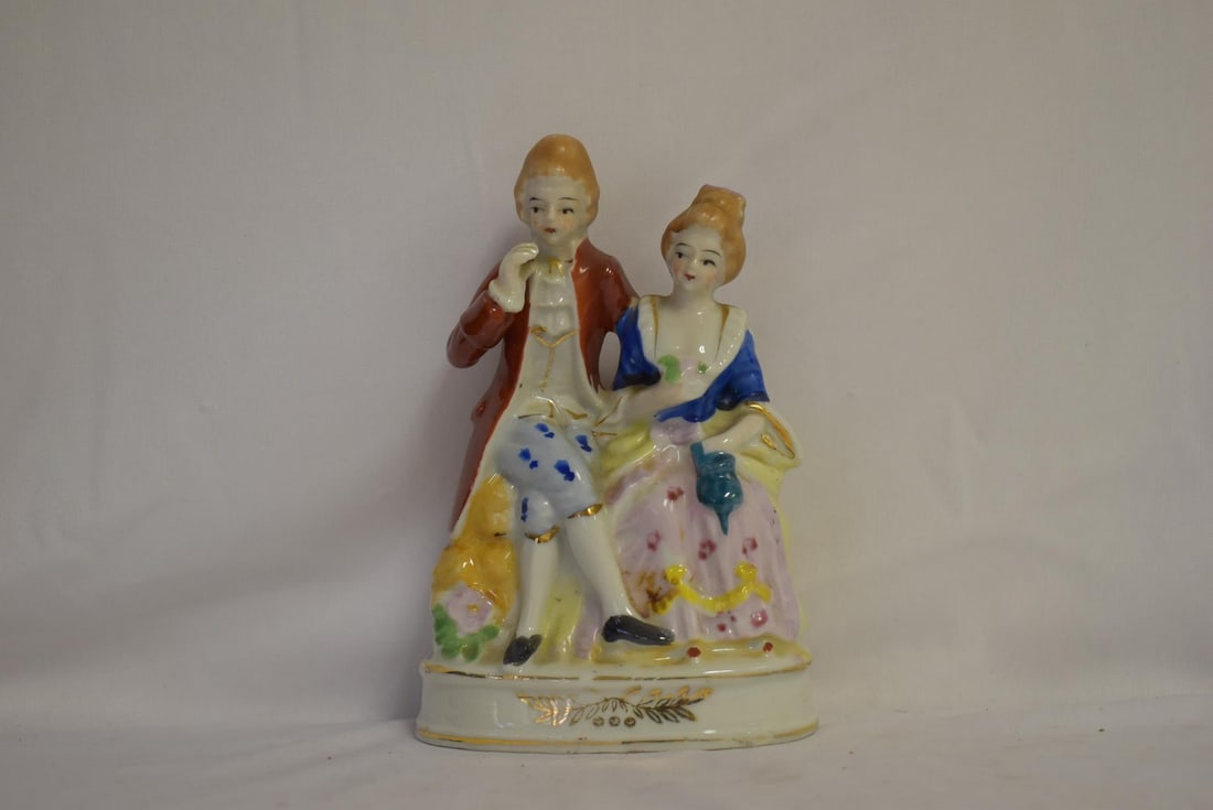 A Vintage Ceramic Figurine: 6" tall