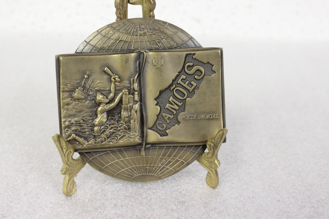 A Bronze Plaque: 3 3/4" long