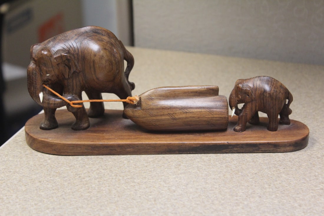 Exotic Wood Two Elephants: please note: one tusk missing on the baby elephant as shown - 8 1/4" long